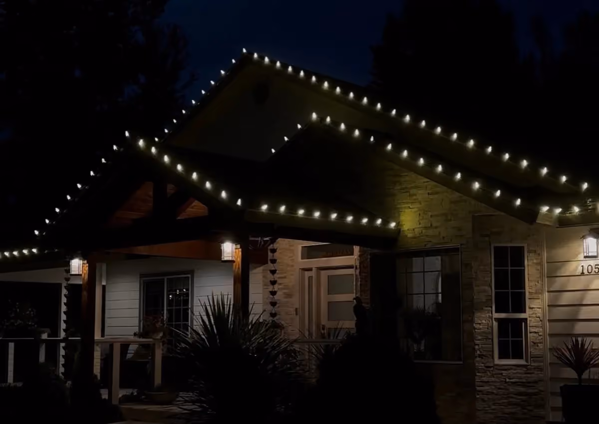 A home with seasonal Christmas roofline lighting installed by Cascade Armor